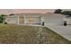 Charming single-story home featuring stucco siding and a two-car garage and a nice front yard at 1312 Catalina Blvd, Deltona, FL 32725