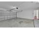 Spacious two car garage with an automatic door and interior access to the home at 1312 Catalina Blvd, Deltona, FL 32725