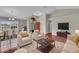 Bright living room features a large window and an open layout with a dining area at 1312 Catalina Blvd, Deltona, FL 32725