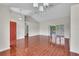 Spacious, open-concept living room with vaulted ceilings and patio access at 1312 Catalina Blvd, Deltona, FL 32725