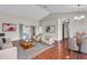Open-concept living space with sleek tile flooring and modern decor at 1312 Catalina Blvd, Deltona, FL 32725