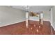 Open-concept living room with tile floors and natural light at 1312 Catalina Blvd, Deltona, FL 32725
