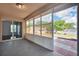 Enclosed patio with windows providing natural light and a view of the outdoor area at 1312 Catalina Blvd, Deltona, FL 32725