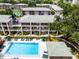 Aerial view of the community showcasing the pool, landscaping, and surrounding buildings at 136 Blue Point Way # 320, Altamonte Springs, FL 32701