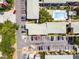 Aerial top-down view of the community, showcasing parking, pool, and green spaces at 136 Blue Point Way # 320, Altamonte Springs, FL 32701
