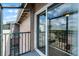 View from the balcony, showcasing the sliding glass door and screen enclosure at 136 Blue Point Way # 320, Altamonte Springs, FL 32701