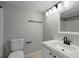 Modern bathroom featuring a sleek sink, stylish mirror, lighting fixture, and neutral tones for a clean and updated look at 136 Blue Point Way # 320, Altamonte Springs, FL 32701