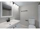 Bathroom with a modern sink, stylish mirror, lighting fixture, and neutral tones for a clean and updated look at 136 Blue Point Way # 320, Altamonte Springs, FL 32701