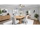 Stylishly staged dining room with a table for four and modern decor at 136 Blue Point Way # 320, Altamonte Springs, FL 32701