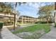 Manicured lawns and garden-like grounds with putting green between buildings at 136 Blue Point Way # 320, Altamonte Springs, FL 32701