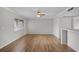 Living room has wood-look floors, neutral tones, and a versatile space at 136 Blue Point Way # 320, Altamonte Springs, FL 32701