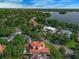 Stunning aerial view of a lakeside community featuring lush greenery and beautiful homes at 1401 Green Cove Rd, Winter Park, FL 32789