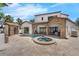 Mediterranean backyard featuring pool, spa, stone accents, and lush landscaping for ultimate relaxation and privacy at 1401 Green Cove Rd, Winter Park, FL 32789