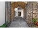 Stone archway entrance provides a unique and welcoming entrance to this house at 1401 Green Cove Rd, Winter Park, FL 32789