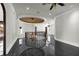 Grand foyer boasts marble floors, decorative ceiling, iron staircase, and open layout, perfect for entertaining at 1401 Green Cove Rd, Winter Park, FL 32789
