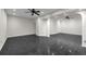 Spacious living room features dark flooring and recessed lighting at 1401 Green Cove Rd, Winter Park, FL 32789