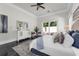 Inviting main bedroom featuring marble floors, soft decor, and a peaceful ambiance at 1401 Green Cove Rd, Winter Park, FL 32789