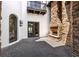Outdoor patio area includes an inviting stone fireplace and elegant architectural details at 1401 Green Cove Rd, Winter Park, FL 32789