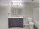 Updated bathroom features a vanity with gold hardware and a shower/tub combo at 1455 Blue Horizon Dr, Clermont, FL 34714