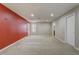 Spacious bonus room features neutral carpeting, recessed lighting, and bright, airy atmosphere at 1455 Blue Horizon Dr, Clermont, FL 34714