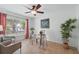 Office featuring tile floors, ample natural light, and stylish furnishings at 14848 Bonnybridge Dr, Orlando, FL 32826