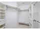 Well-organized walk-in closet with ample shelving and storage space at 14848 Bonnybridge Dr, Orlando, FL 32826