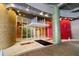 Inviting building entrance with mosaic columns and glass doors welcomes residents at 155 S Court Ave # 2403, Orlando, FL 32801