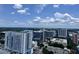 Wonderful city and treeline view from a high floor of this condominium at 155 S Court Ave # 2403, Orlando, FL 32801
