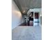 Open-concept living space with modern kitchen and plush gray carpeting at 155 S Court Ave # 2403, Orlando, FL 32801