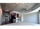 Open-concept living space with modern kitchen and plush gray carpeting at 155 S Court Ave # 2403, Orlando, FL 32801