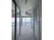 Bright living space with plush gray carpeting, large windows, and expansive views at 155 S Court Ave # 2403, Orlando, FL 32801