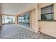 Covered patio with decorative tile flooring and views of the backyard at 1802 Imperial Palm Dr, Apopka, FL 32712