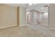 Spacious bonus room featuring neutral carpet, baseboards, and a ceiling fan for added comfort and style at 1942 Michael Tiago Cir, Maitland, FL 32751