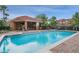 Inviting community pool area featuring a covered lounge and comfortable seating at 1942 Michael Tiago Cir, Maitland, FL 32751