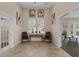 Welcoming lobby area with comfortable seating, natural light, and tasteful decor at 1942 Michael Tiago Cir, Maitland, FL 32751
