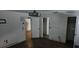 Spacious bedroom with dark wood flooring and three closets at 1985 Japonica Rd, Winter Park, FL 32792