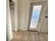 Interior door with decorative textured glass for privacy and light at 1985 Japonica Rd, Winter Park, FL 32792
