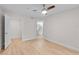 Bedroom with ceiling fan and doorways to a closet and bathroom at 2213 Grand Cayman Ct # 1138, Kissimmee, FL 34741