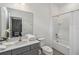 Bathroom featuring a tub/shower combo, toilet, and a vanity with a large mirror at 2574 Shanti Dr, Kissimmee, FL 34746