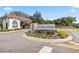 Veranda Palms community entrance welcomes with lush landscaping and elegant signage at 2574 Shanti Dr, Kissimmee, FL 34746