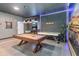 Features a pool table, foosball table, and arcade game offering a variety of entertainment at 2574 Shanti Dr, Kissimmee, FL 34746
