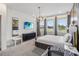 A modern bedroom with a large bed, dresser, and three large windows providing plenty of natural light at 2574 Shanti Dr, Kissimmee, FL 34746