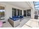 Outdoor patio area with comfortable seating, perfect for relaxation and entertaining at 2574 Shanti Dr, Kissimmee, FL 34746