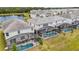 Attractive backyards with screened-in pools and pristine landscaping are perfect for outdoor enjoyment at 2574 Shanti Dr, Kissimmee, FL 34746