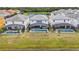 Stunning backyards feature screened pools with views of lush green lawns, creating a private oasis at 2574 Shanti Dr, Kissimmee, FL 34746