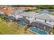 Scenic backyard view showcases the screened-in pools and manicured lawns at 2574 Shanti Dr, Kissimmee, FL 34746