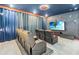 A theater room with comfortable recliner seating for an immersive entertainment experience at 2574 Shanti Dr, Kissimmee, FL 34746