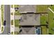 Aerial view of the property within a community showcasing the backyard with an adjacent property with a pool at 2591 Seagirt Way, Clermont, FL 34711