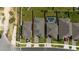 Aerial view of property highlighting roof, yard, and location relative to neighbors at 2591 Seagirt Way, Clermont, FL 34711