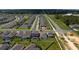 Drone shot displays home's placement amidst a thriving, well-planned community at 2591 Seagirt Way, Clermont, FL 34711